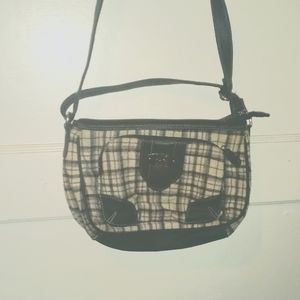 Black and white checkered hand bag with strap